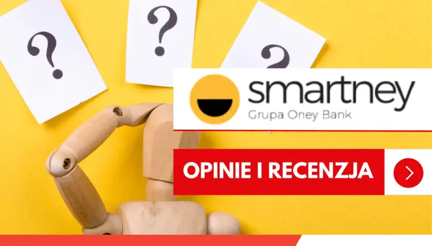 Drewniany manekin z pytajnikami zastanawia się nad przyznawalnością Smartney. Opinie i recenzja.